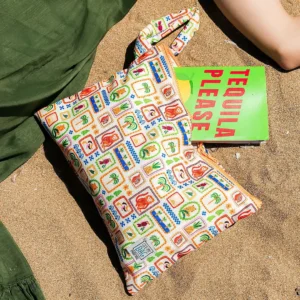 Girl holding a See My Bag wetbag